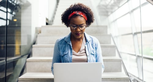 focused-young-african-student-sitting-on-stairs-us-2024-09-18-15-40-42-utc