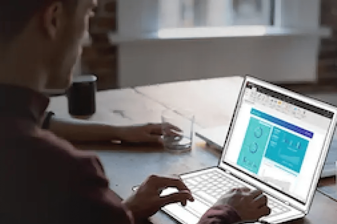 man working with a laptop