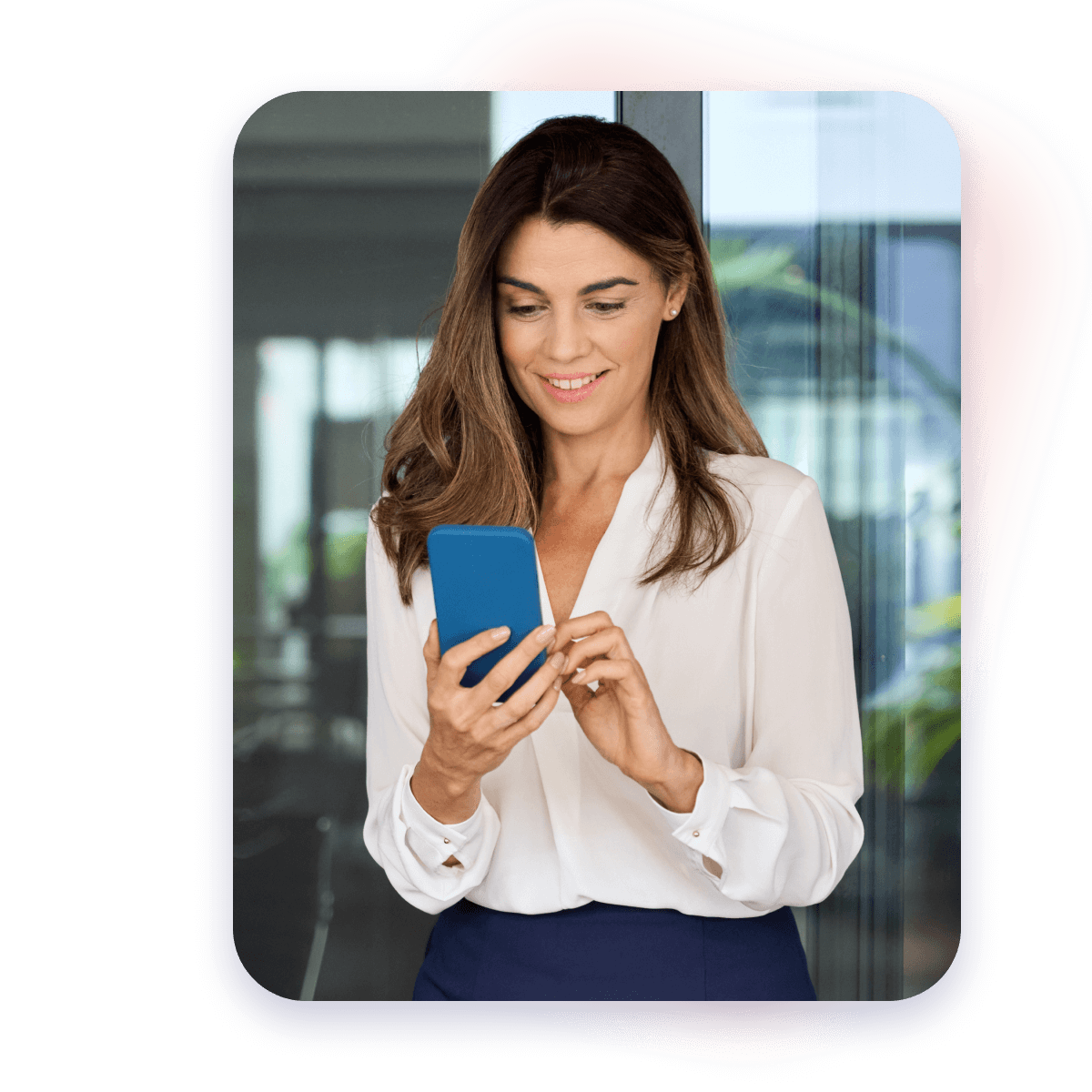 woman looking at mobile device