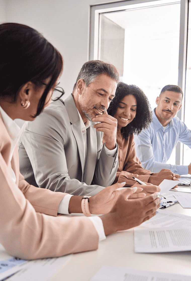 Legal team explaining documents to a man